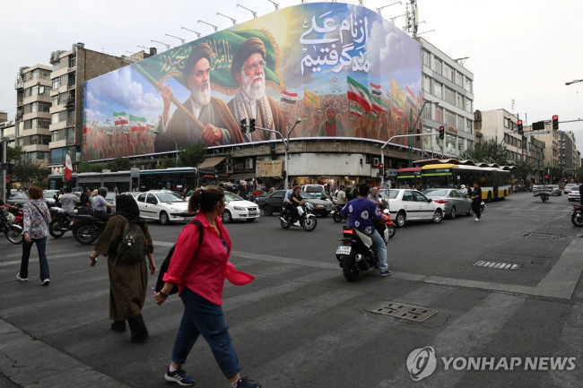 Portraits of past Iranian Supreme Leaders displayed in Tehran, Iran.