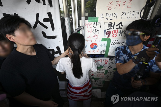 Protest participant blocks entry to Jamsil Handball Stadium