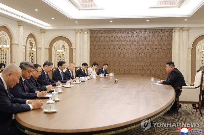 Kim Jong Un meets with Wang Huning of China
